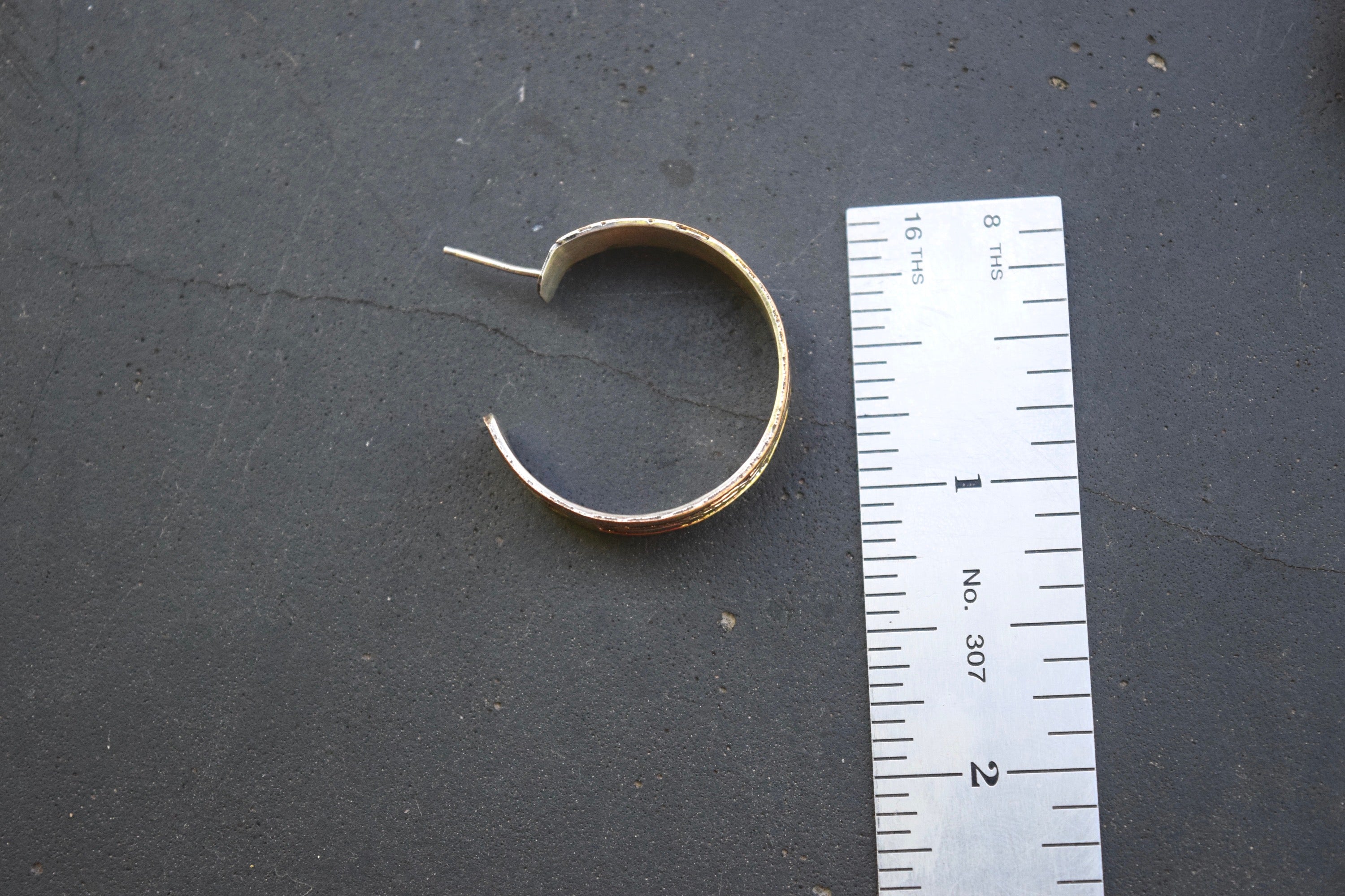 SILVER AND GOLD FEATHER HOOPS FROM THE RODGERS COLLECTION