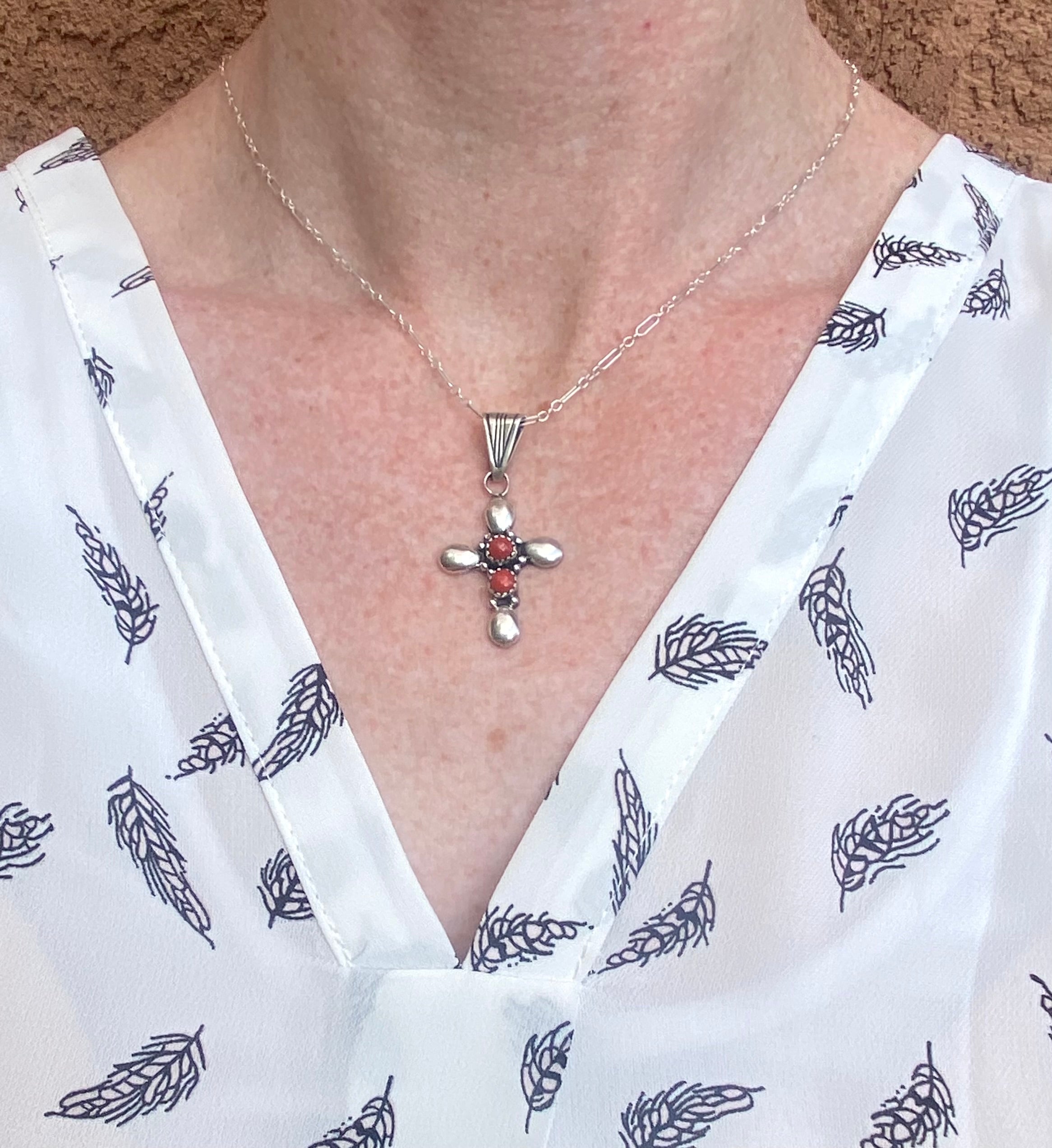 Coral Cross Necklace From The Rodgers Collection.