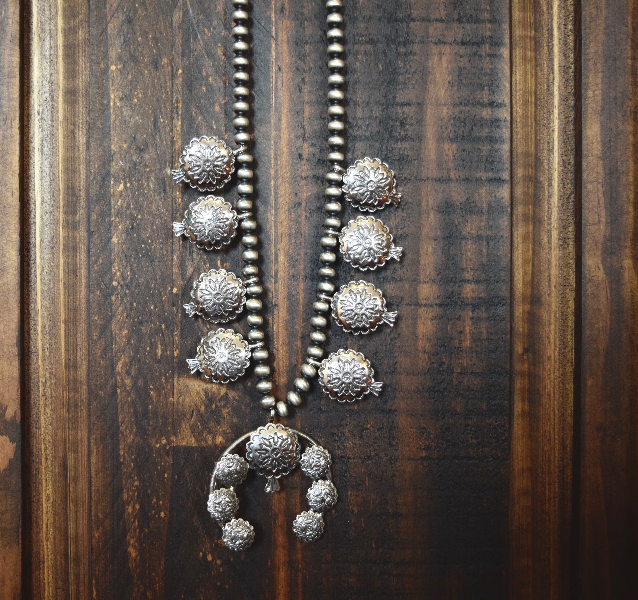 CONCHO SQUASH BLOSSOM ON HANDMADE NAVAJO PEARLS
