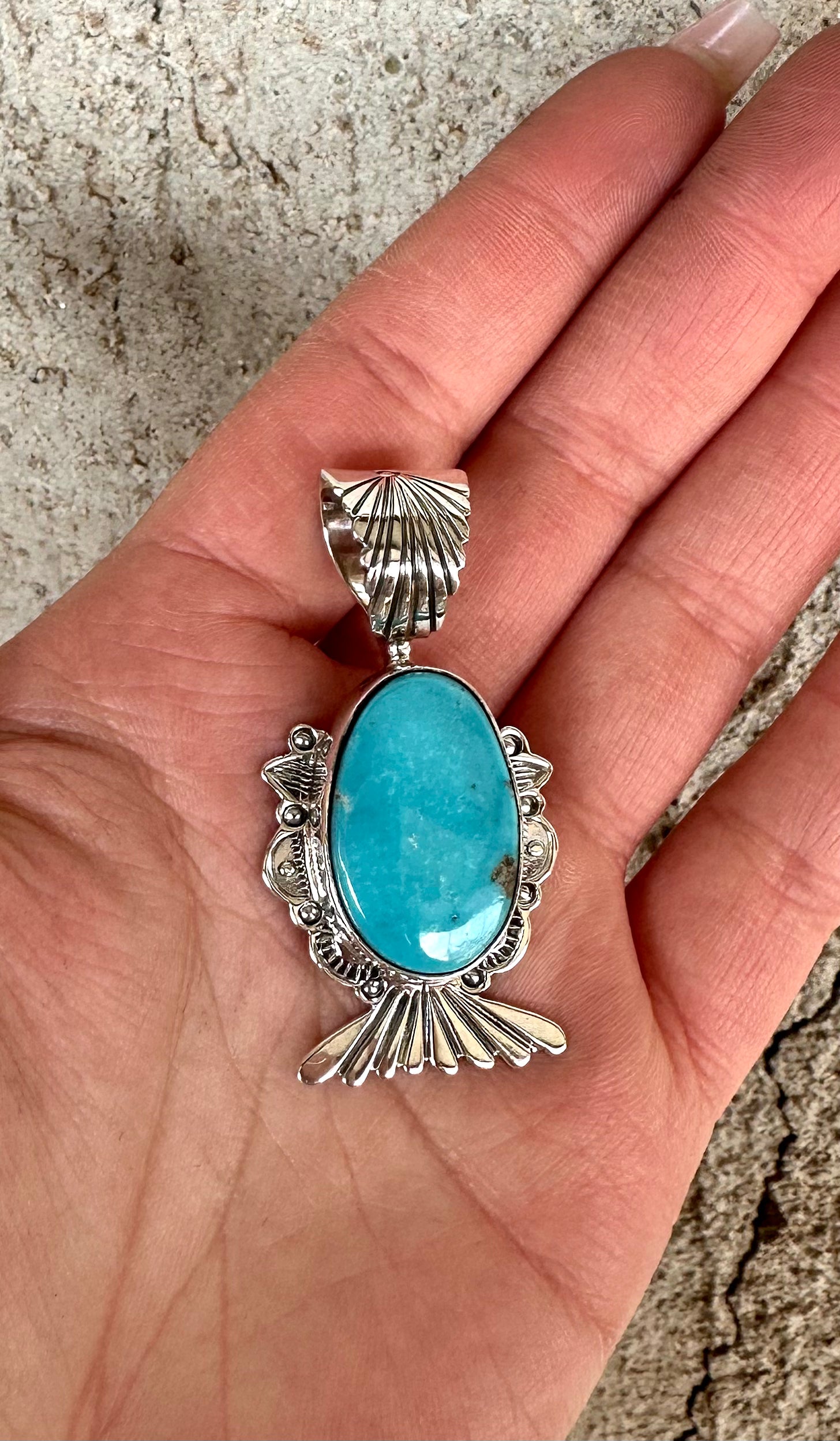 Chasing You Pendant from the Rodgers Collection