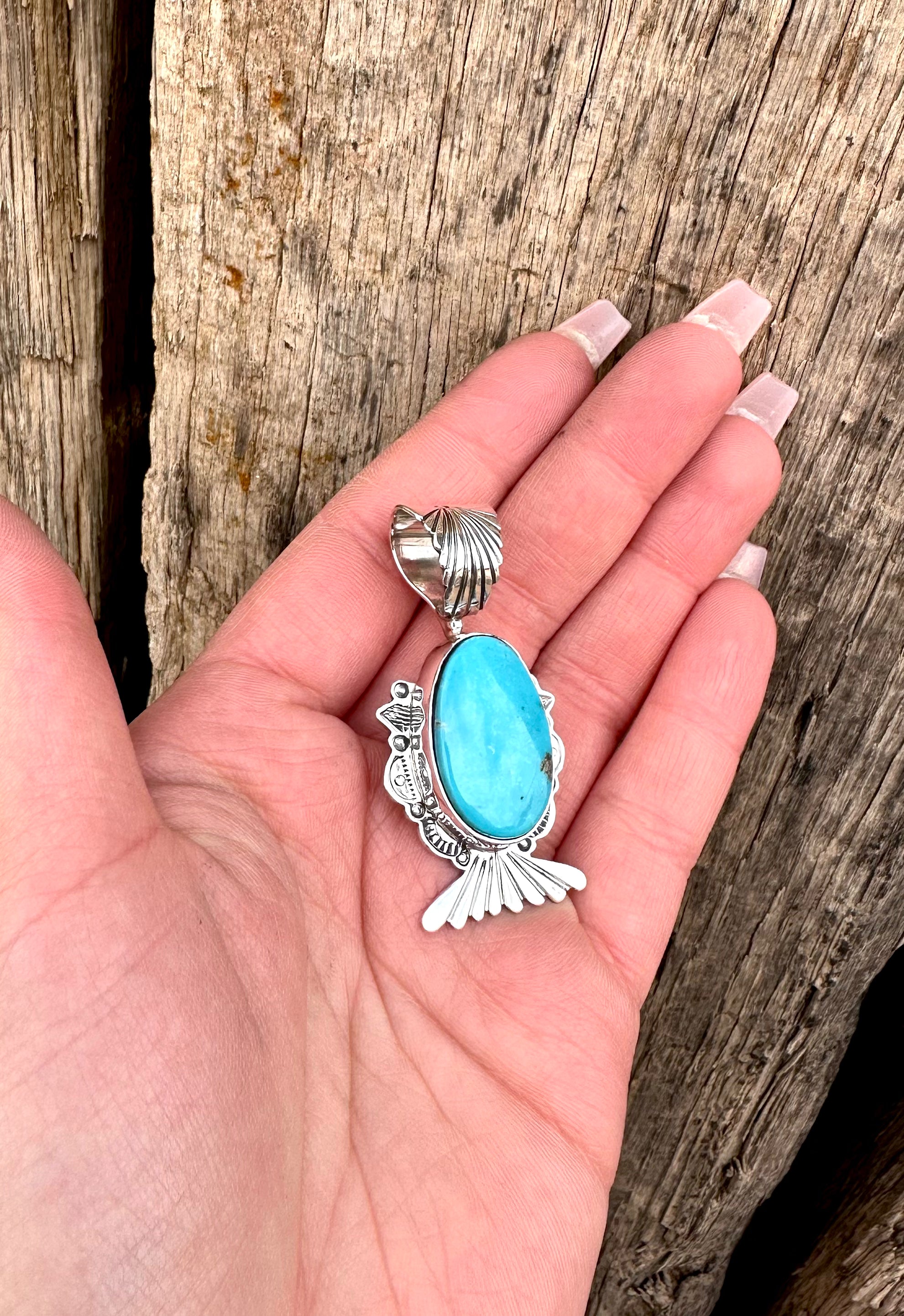 Chasing You Pendant from the Rodgers Collection