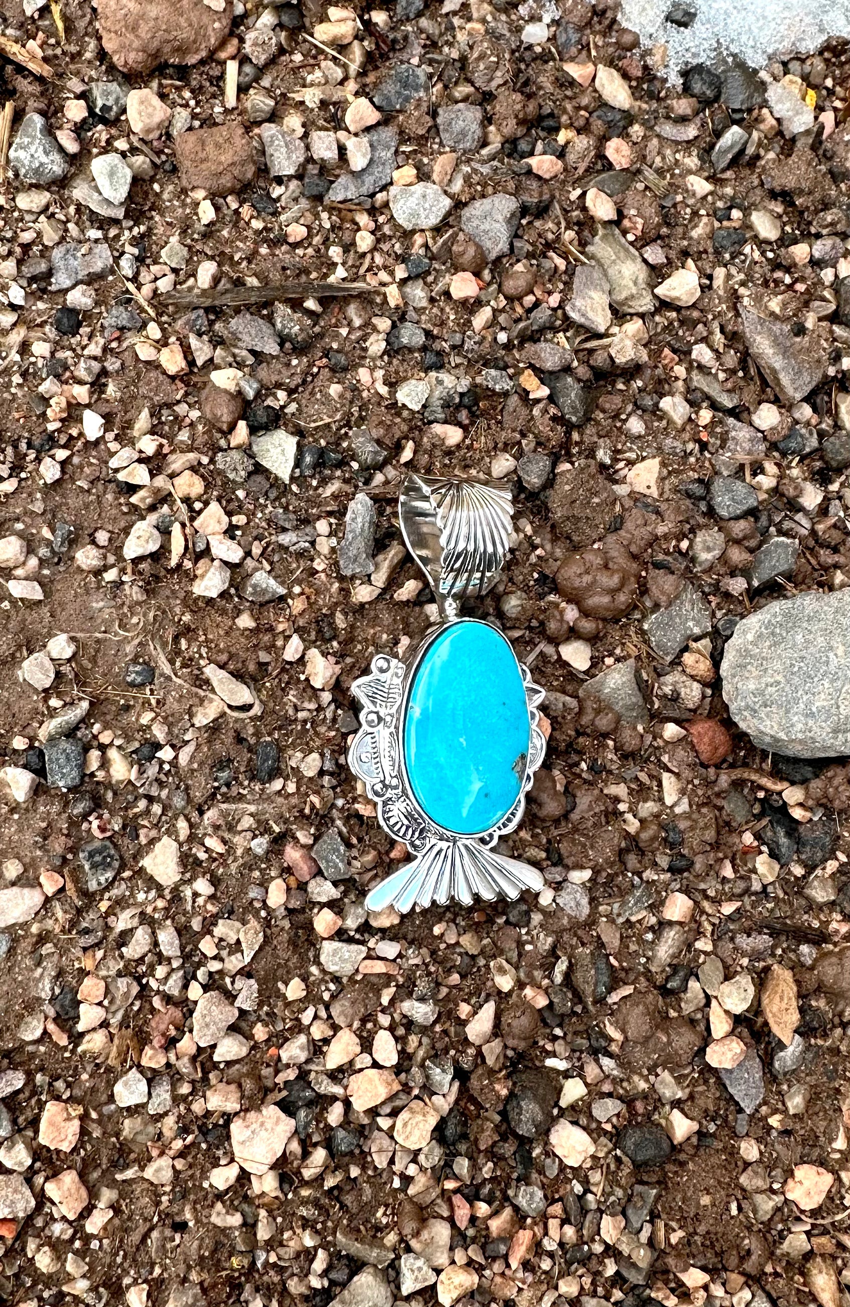 Chasing You Pendant from the Rodgers Collection