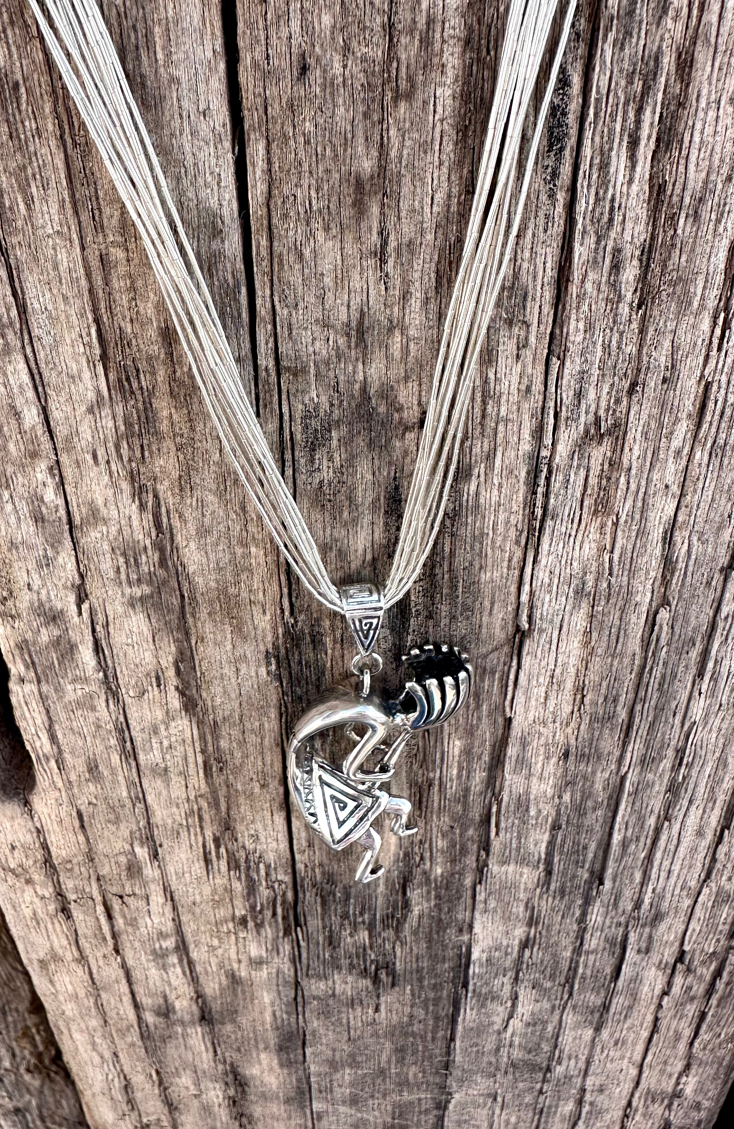Liquid Silver Kokopelli Necklace from the Rodgers Collection