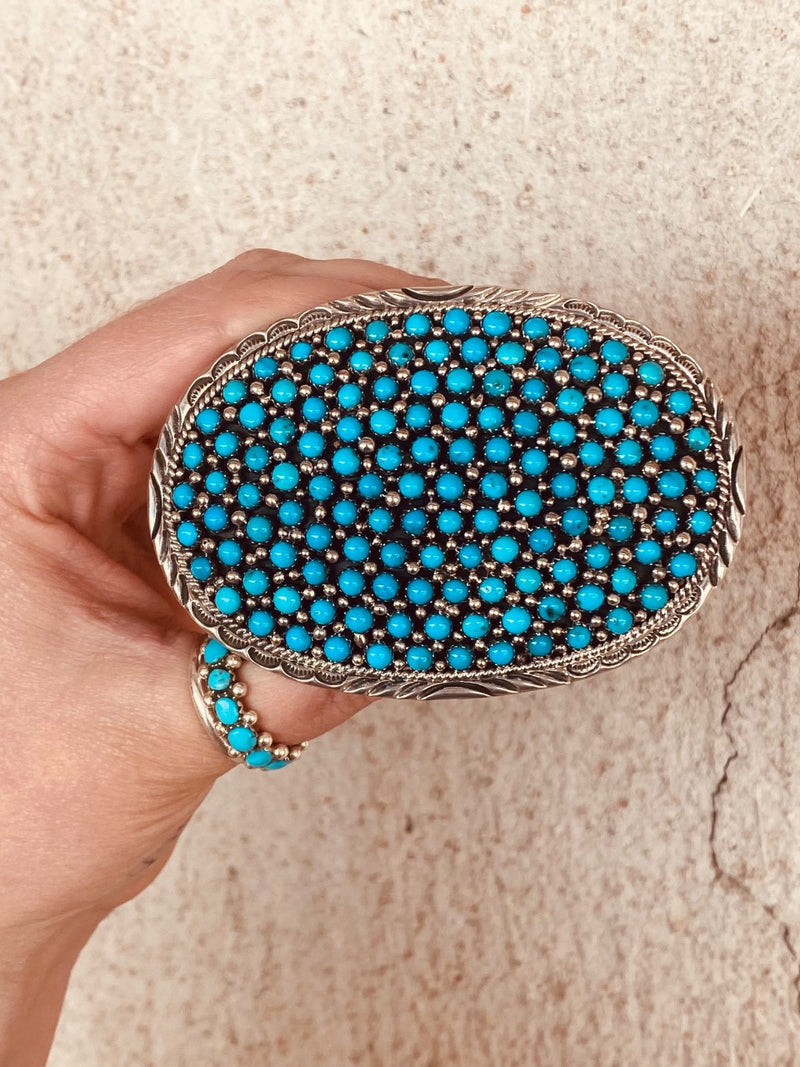 Jimson Belin out did himself on this beauty! This mesmerizing belt buckle features our back stock of sleeping beauty turquoise. This piece is custom made to order, so please give us 4-6 weeks, worth the wait!
