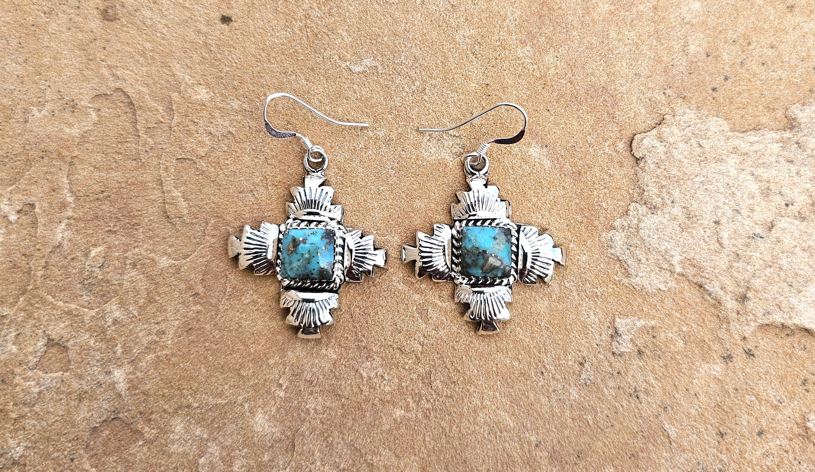 With Almighty Earrrings.