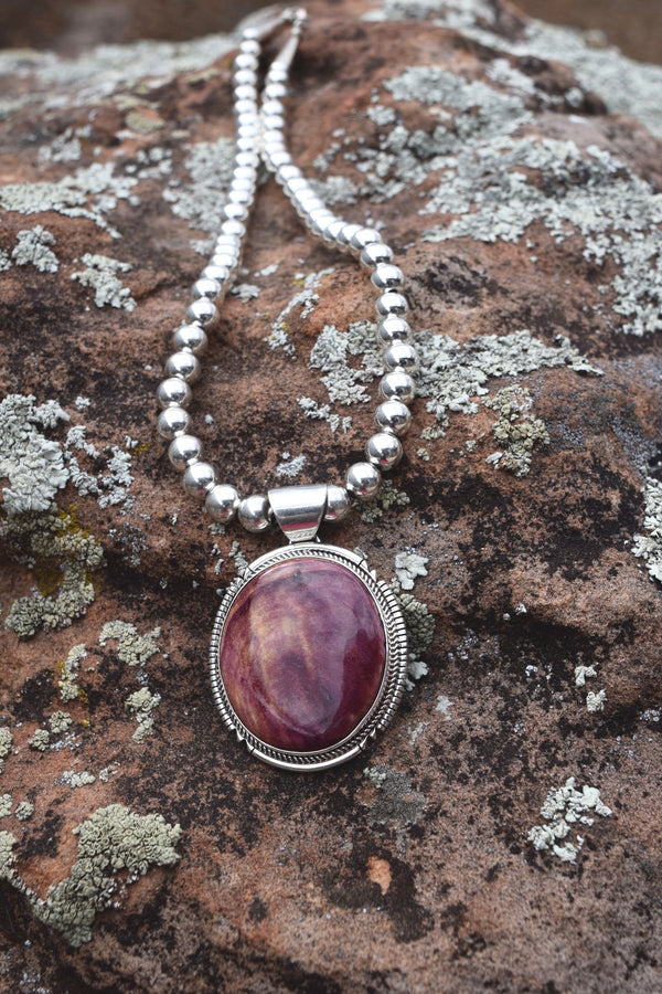 PURPLE SHELL NECKLACE ON SILVER BEADS