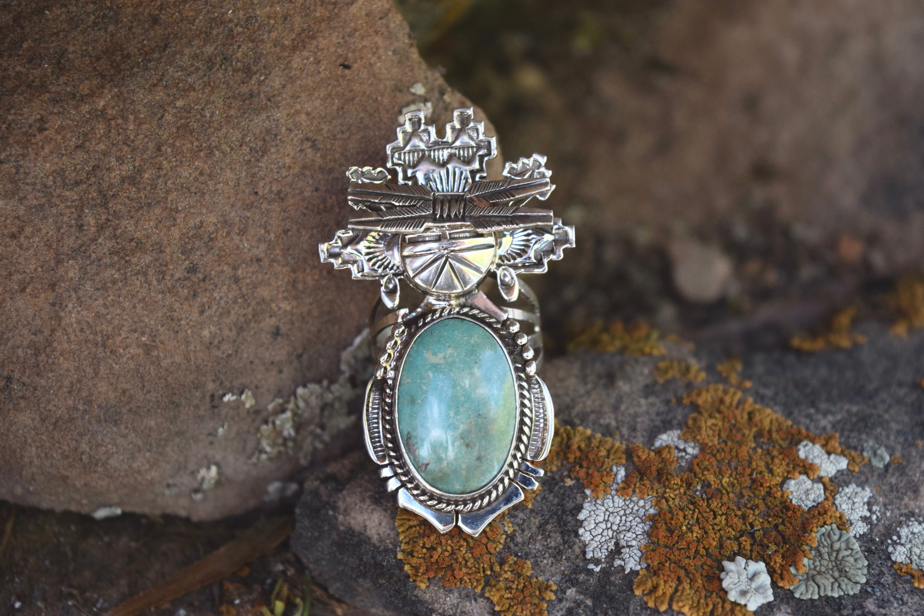 FOUR FEATHERS RING FROM THE RODGERS COLLECTION