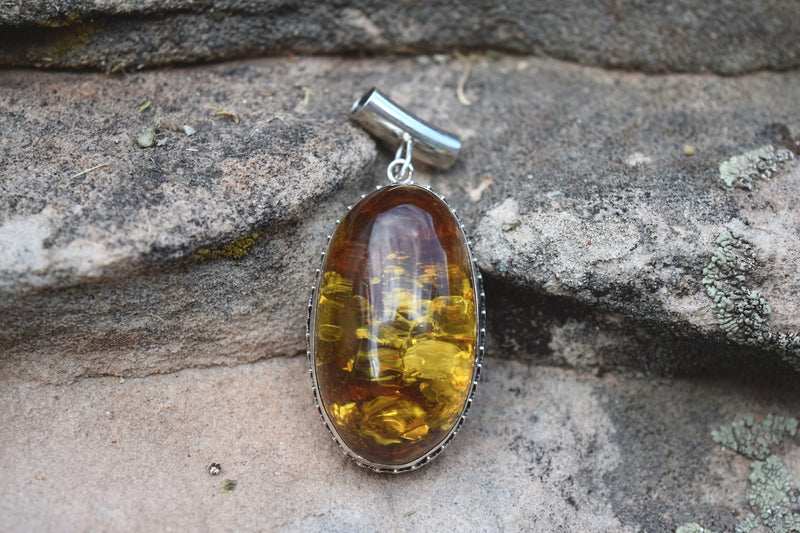 AMBER OVAL PENDANT FROM THE RODGERS COLLECTION