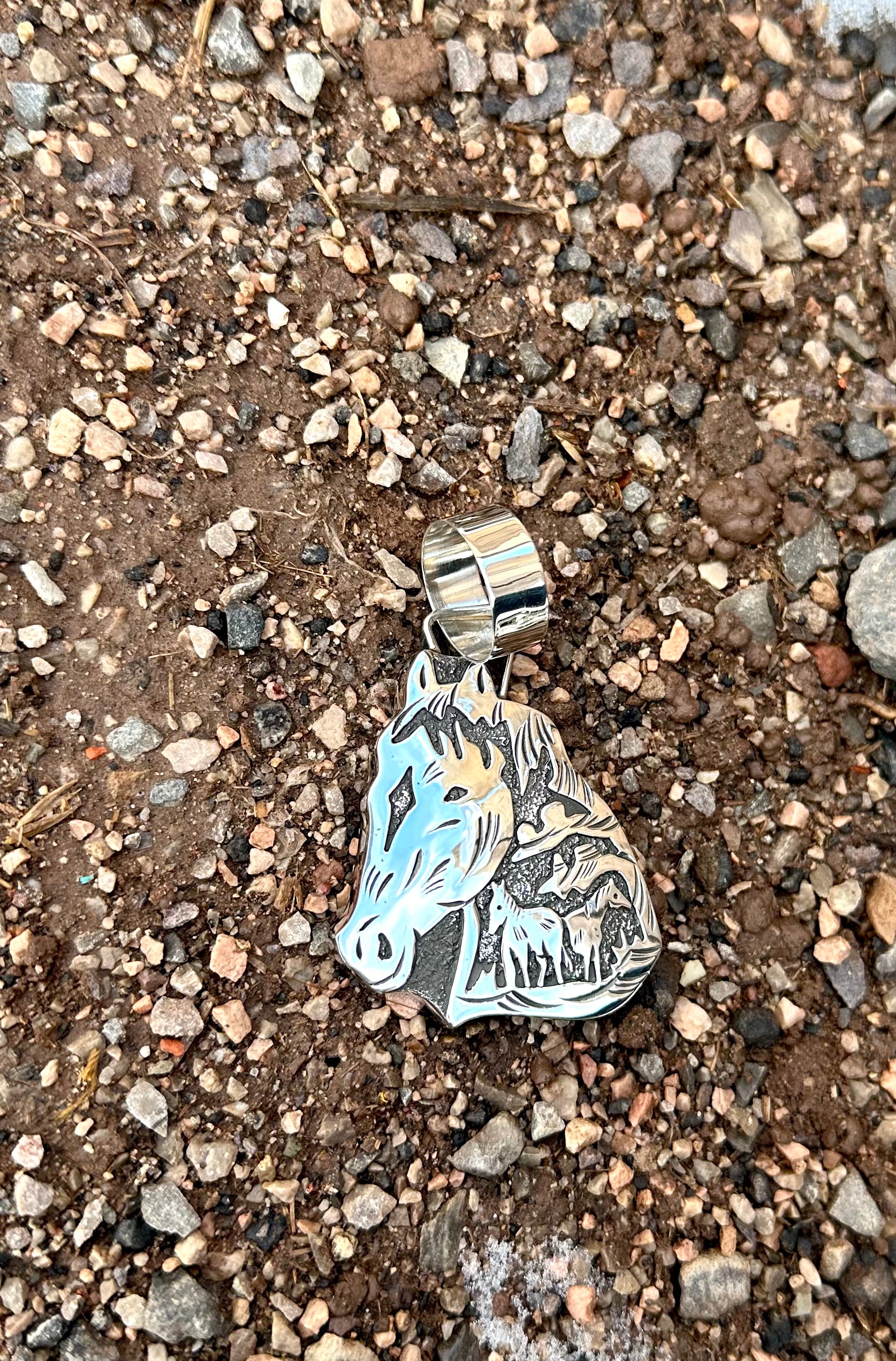 A Mothers Colts Pendant from the Rodgers Collection