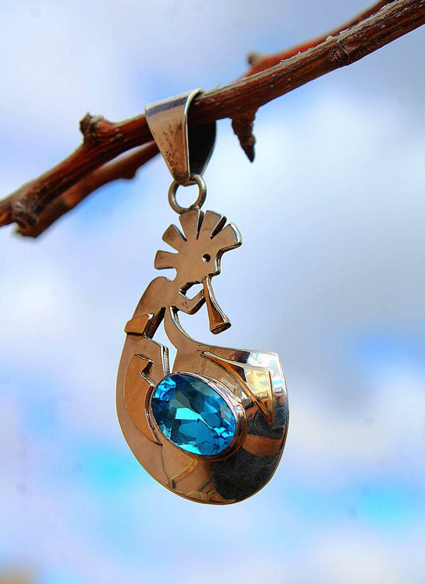 Singing Beauty Blue Topaz Pendant