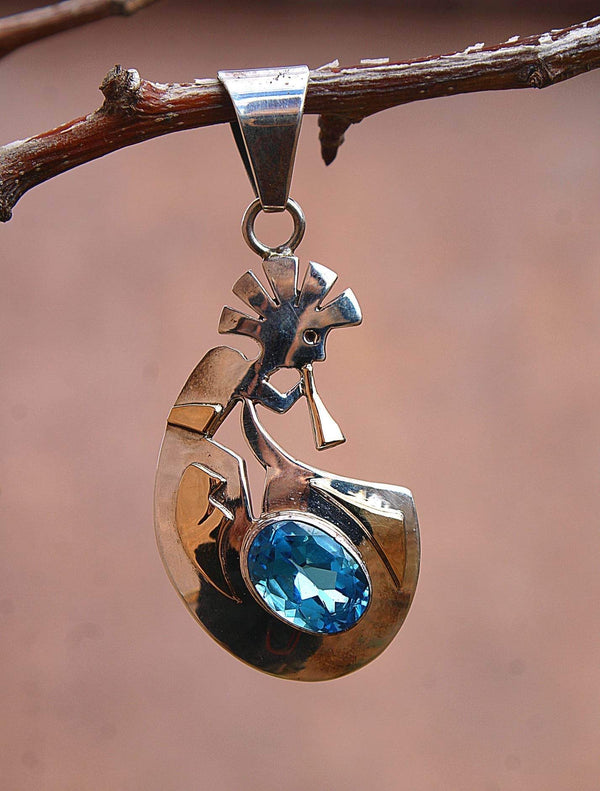 Singing Beauty Blue Topaz Pendant