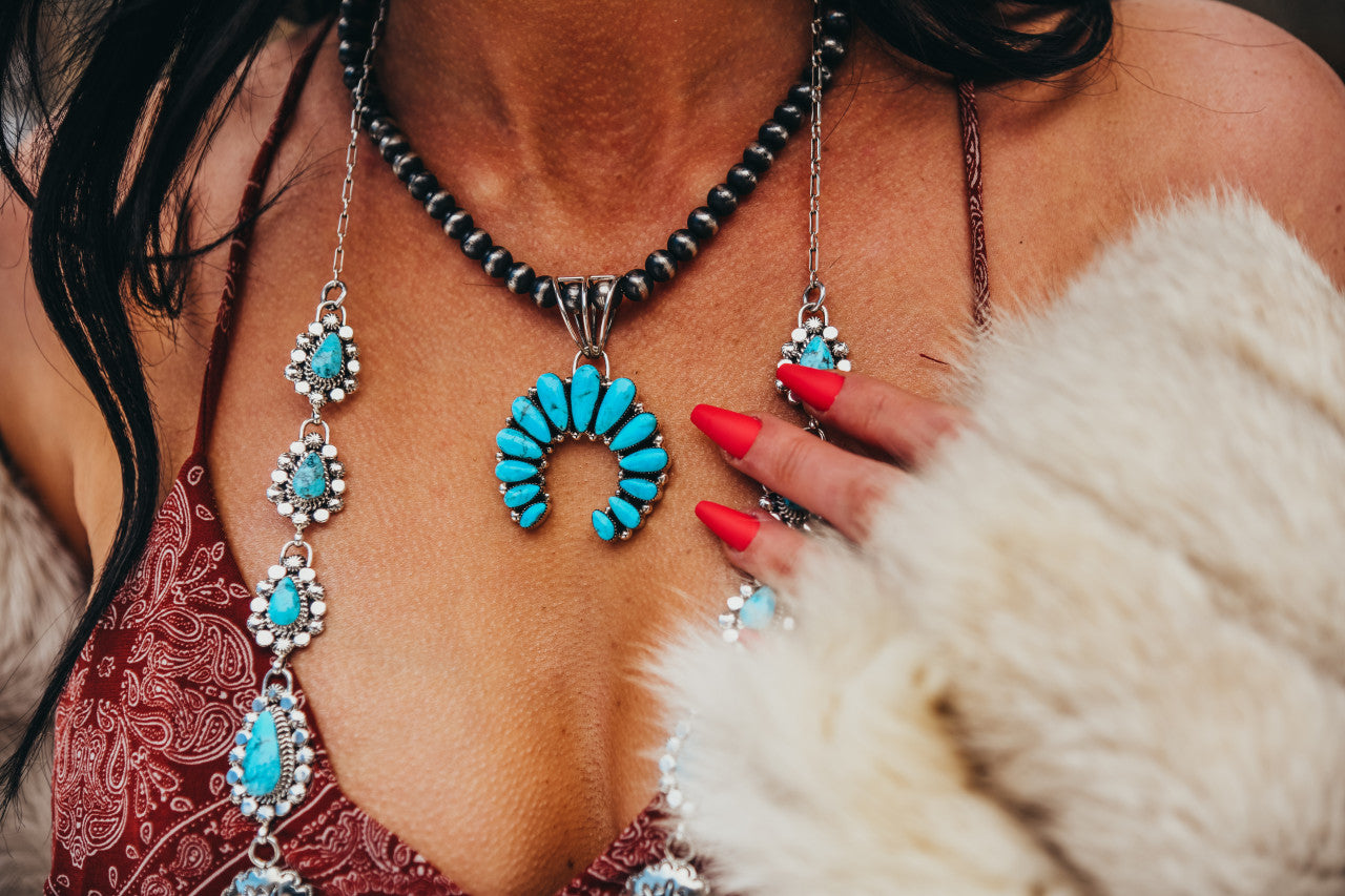 A statement piece in our line! This beauty is created by Navajo artist Jimson Belin. All stones are cut in house to create this one of a kind look!