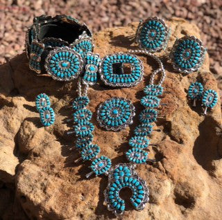 Traditional Navajo Turquoise Concho Belt, Squash Blossom, Two Cluster Bracelets, Two Rings, Pair of Earrings, And a Pin